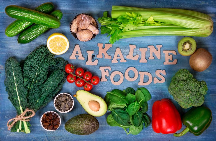 Alkaline foods above the wooden background